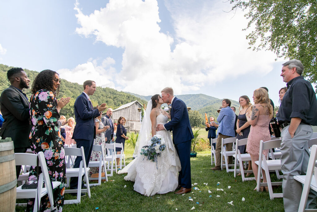 Bride and groom at their elegant Blue Ridge Mountain wedding at Stoneyman Valley Ranch – romantic sunset portraits, adventurous love, and breathtaking views.