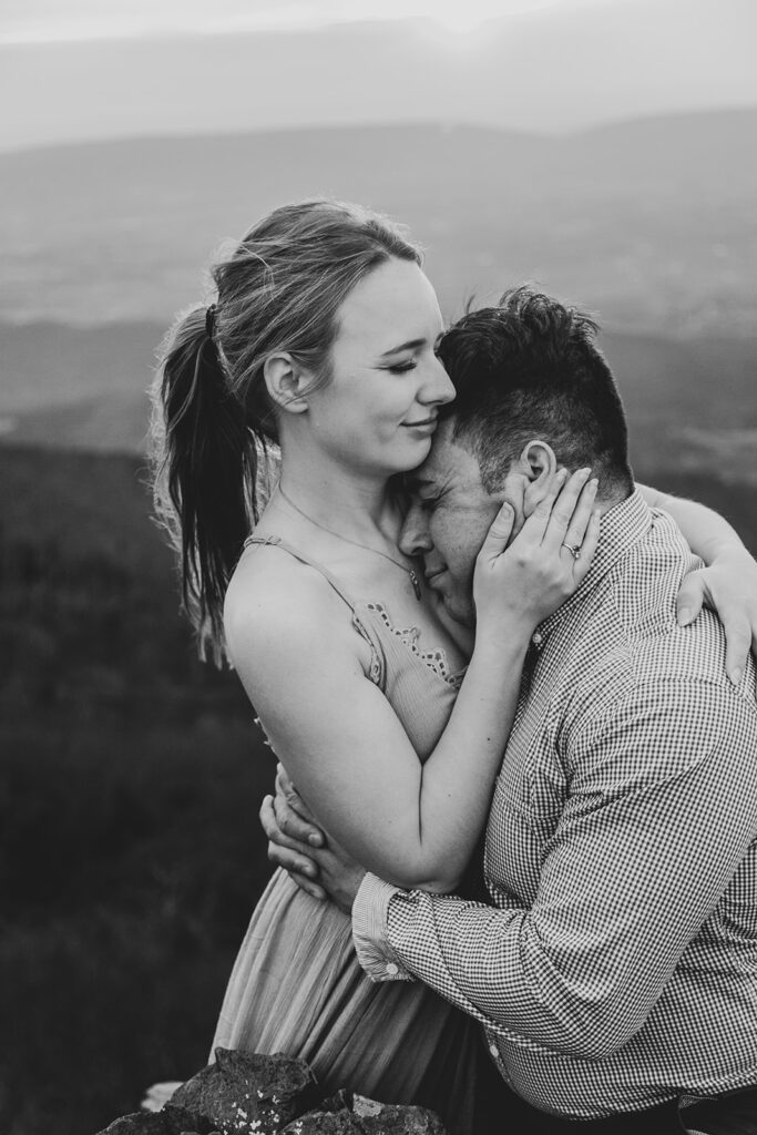 Adventure engagement session at Little Stony Man with stunning Blue Ridge Mountain views