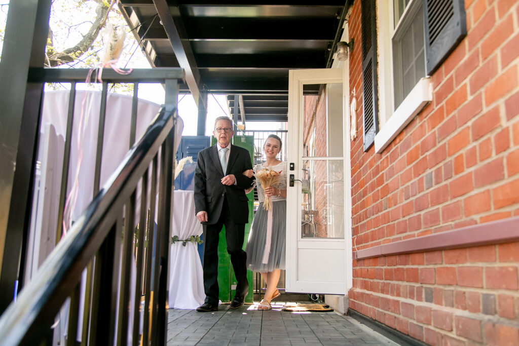 Intimate backyard wedding ceremony in Arlington, VA with close friends and family