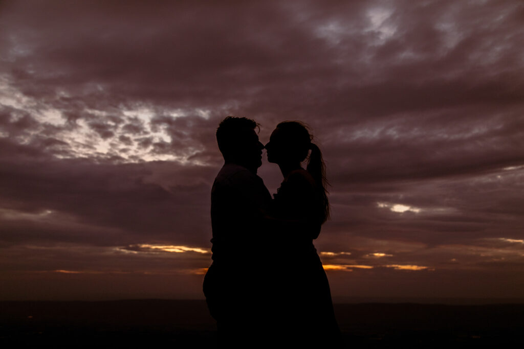 Adventure engagement session at Little Stony Man with stunning Blue Ridge Mountain views