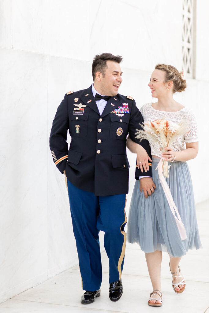 Romantic couple’s wedding photos in front of the Lincoln Memorial’s grand columns for DC elopement