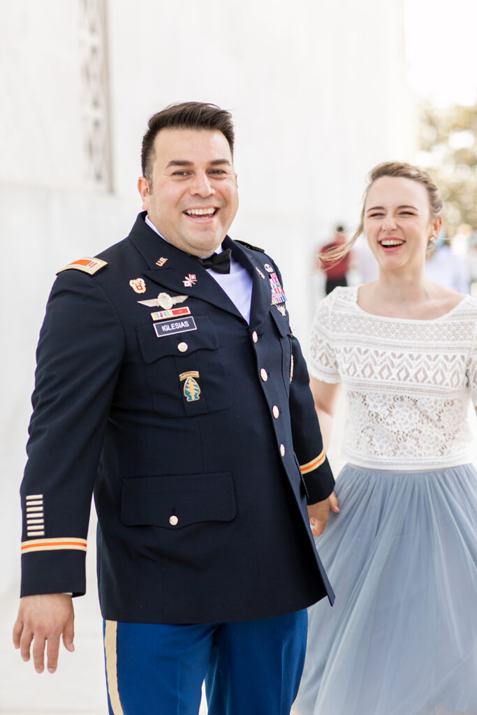 Romantic couple’s wedding photos in front of the Lincoln Memorial’s grand columns for DC elopement