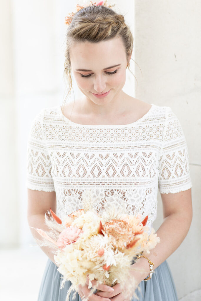 Romantic couple’s wedding photos in front of the Lincoln Memorial’s grand columns for DC elopement