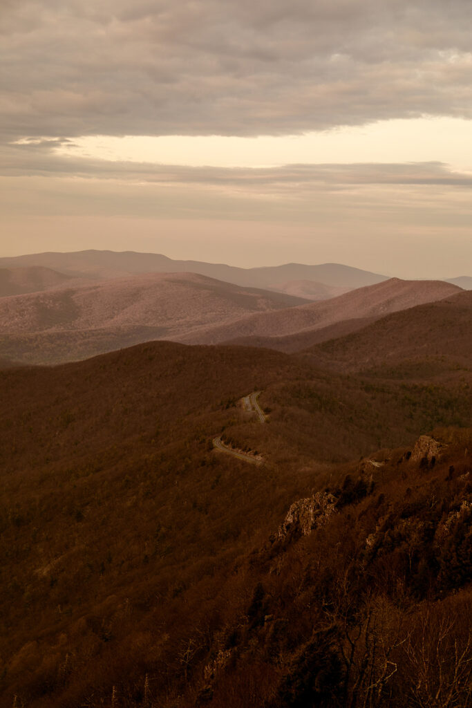 Adventure engagement session at Little Stony Man with stunning Blue Ridge Mountain views