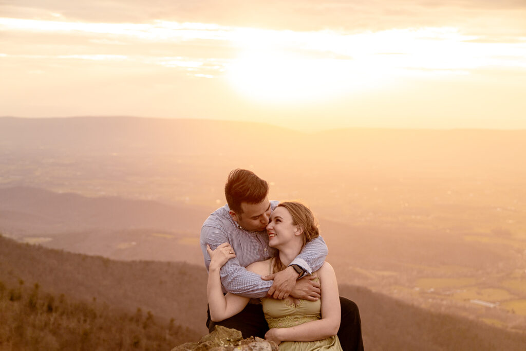 Adventure engagement session at Little Stony Man with stunning Blue Ridge Mountain views