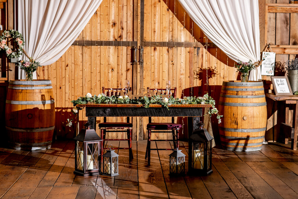 Elegant spring wedding details at Oak Creek Farm in Virginia – romantic floral arrangements, rustic chic decor, and personalized touches from a bride and groom's countryside celebration.