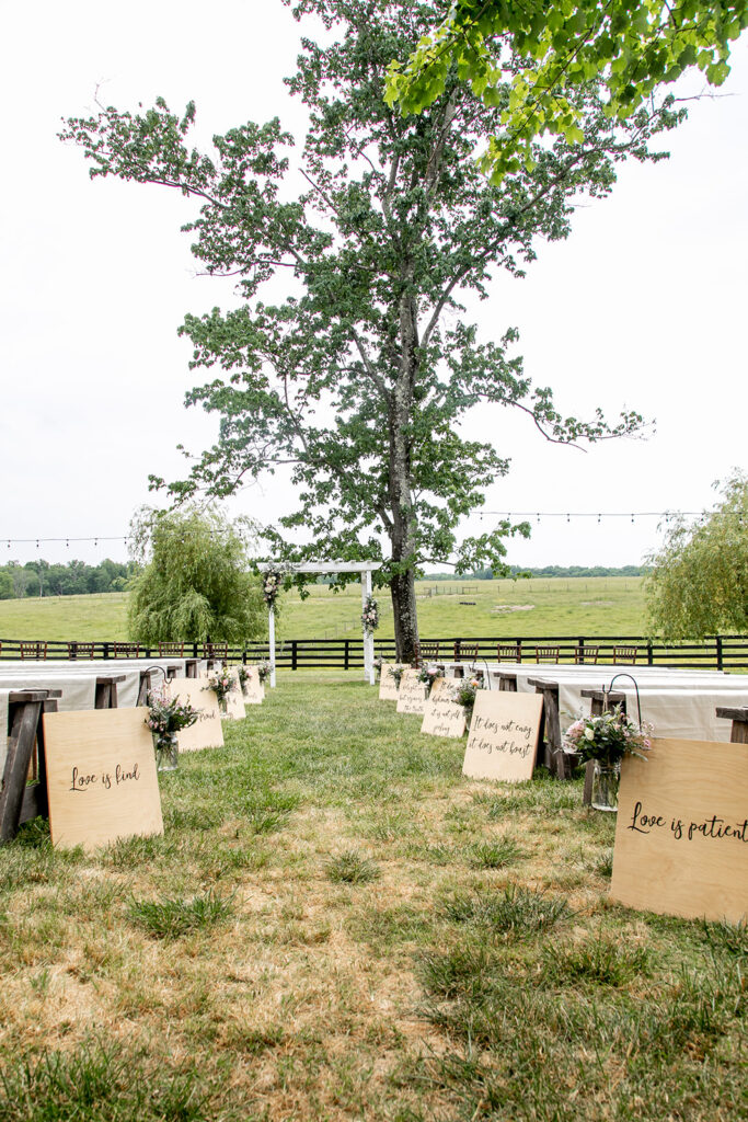 Elegant spring wedding details at Oak Creek Farm in Virginia – romantic floral arrangements, rustic chic decor, and personalized touches from a bride and groom's countryside celebration.