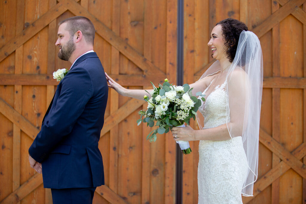 Elegant and adventurous mountain wedding at Stoneyman Valley Ranch – bride and groom portraits with Blue Ridge Mountain views, joyful first look, fun bridal party moments, and stunning sunset photos atop Little Stoneyman Overlook.