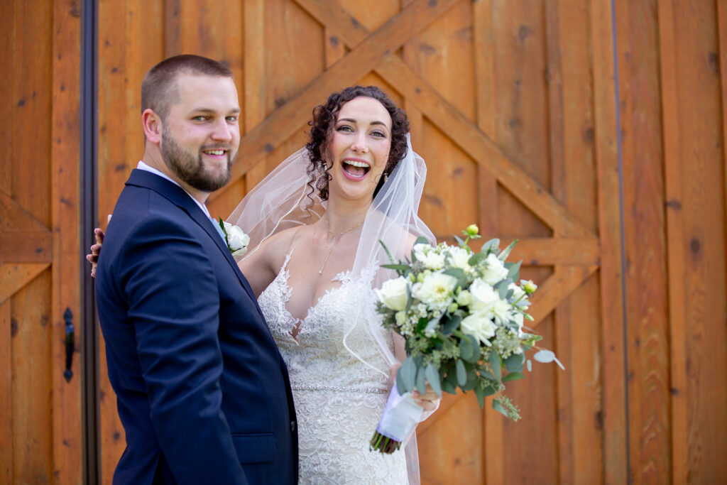 Elegant and adventurous mountain wedding at Stoneyman Valley Ranch – bride and groom portraits with Blue Ridge Mountain views, joyful first look, fun bridal party moments, and stunning sunset photos atop Little Stoneyman Overlook.