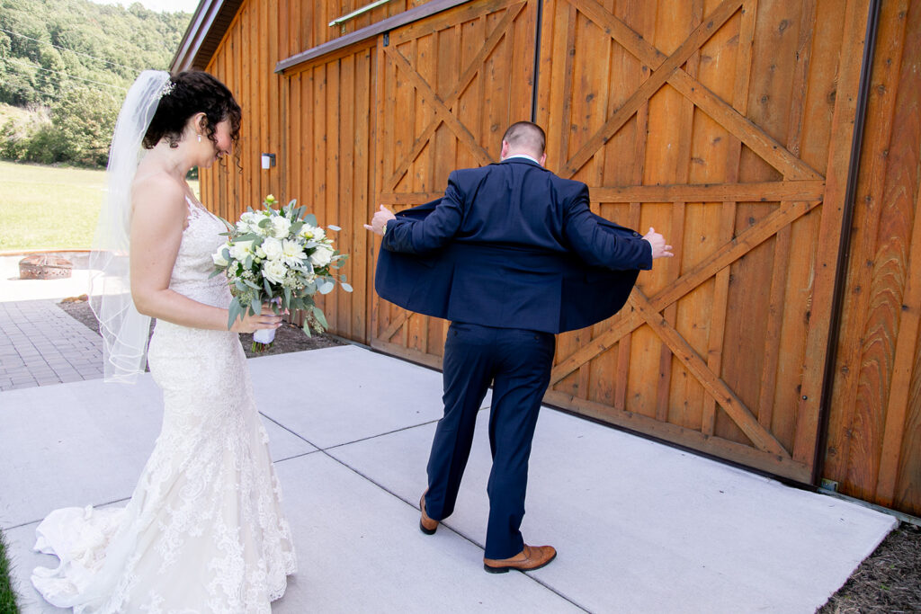 Elegant and adventurous mountain wedding at Stoneyman Valley Ranch – bride and groom portraits with Blue Ridge Mountain views, joyful first look, fun bridal party moments, and stunning sunset photos atop Little Stoneyman Overlook.