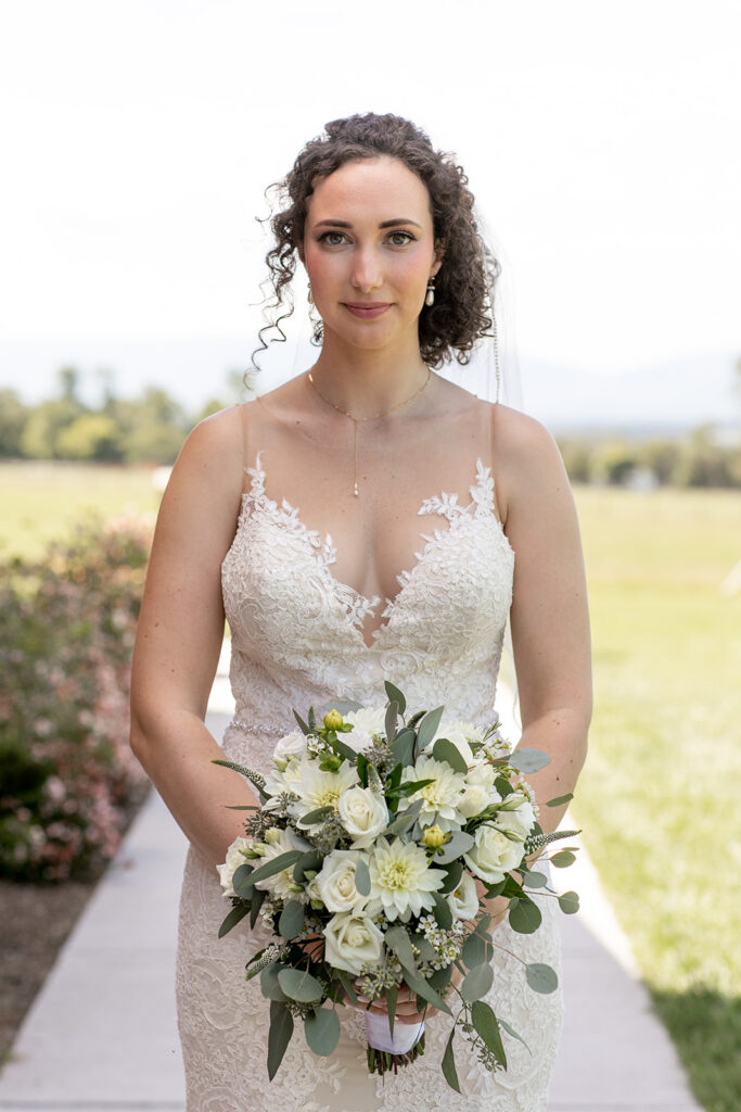 Elegant and adventurous mountain wedding at Stoneyman Valley Ranch – bride and groom portraits with Blue Ridge Mountain views, joyful first look, fun bridal party moments, and stunning sunset photos atop Little Stoneyman Overlook.