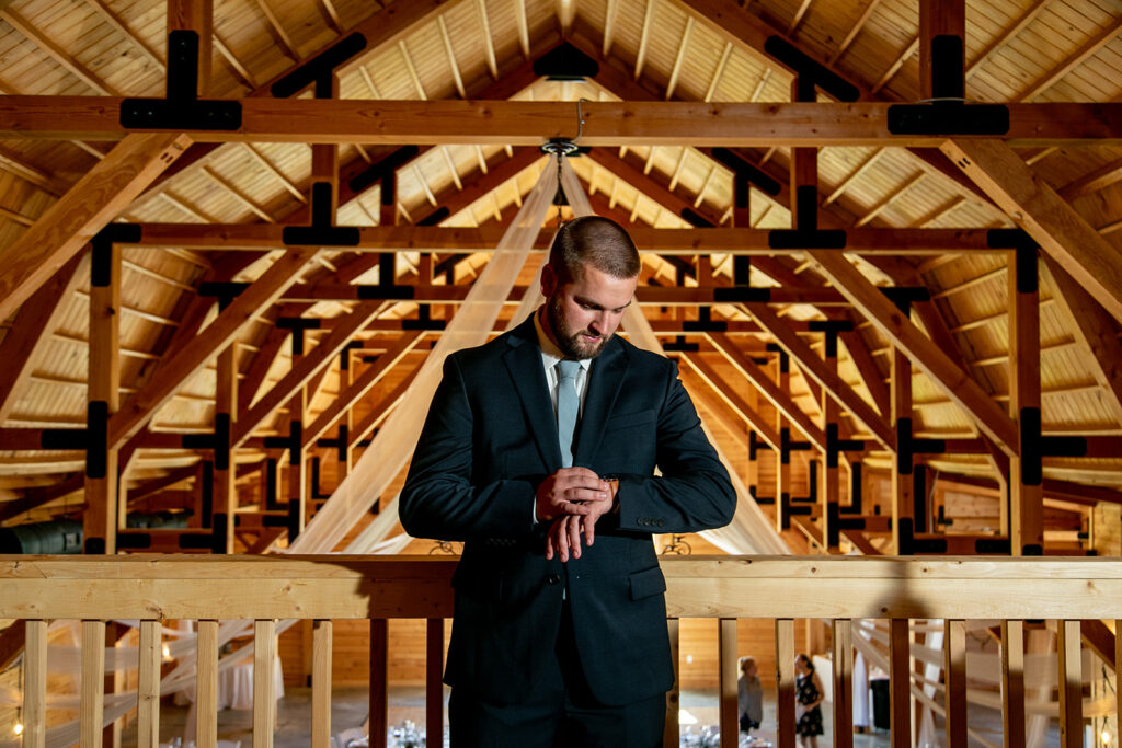 Elegant and adventurous mountain wedding at Stoneyman Valley Ranch – bride and groom portraits with Blue Ridge Mountain views, joyful first look, fun bridal party moments, and stunning sunset photos atop Little Stoneyman Overlook.