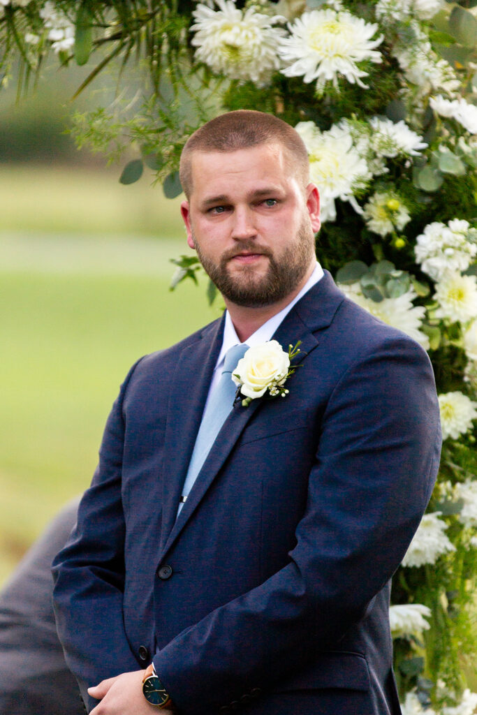 Elegant and adventurous mountain wedding at Stoneyman Valley Ranch – bride and groom portraits with Blue Ridge Mountain views, joyful first look, fun bridal party moments, and stunning sunset photos atop Little Stoneyman Overlook.