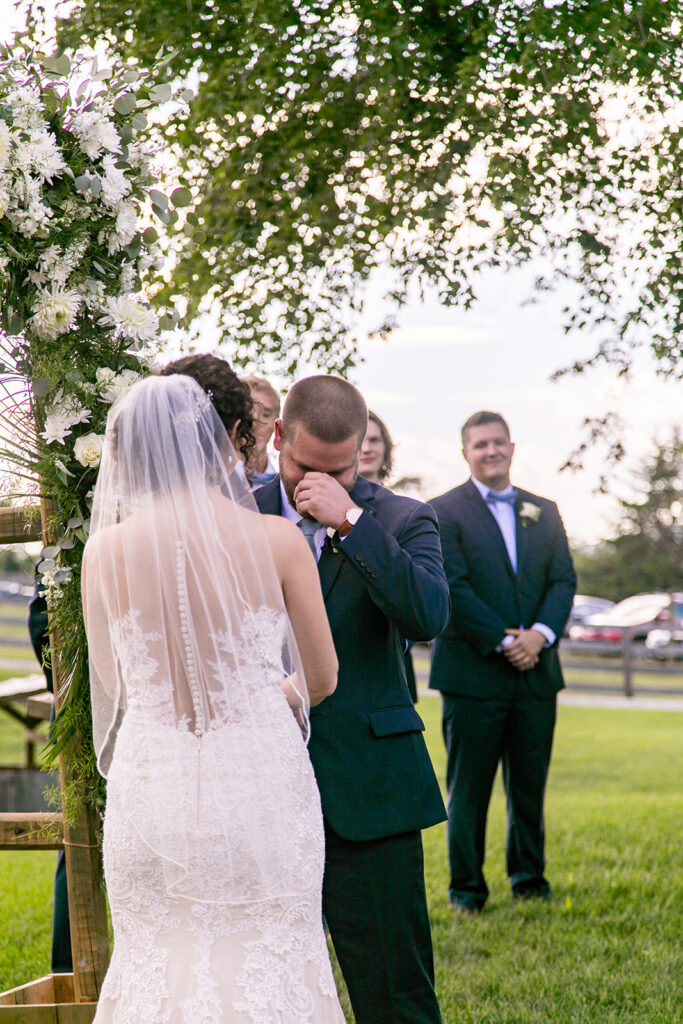 Elegant and adventurous mountain wedding at Stoneyman Valley Ranch – bride and groom portraits with Blue Ridge Mountain views, joyful first look, fun bridal party moments, and stunning sunset photos atop Little Stoneyman Overlook.