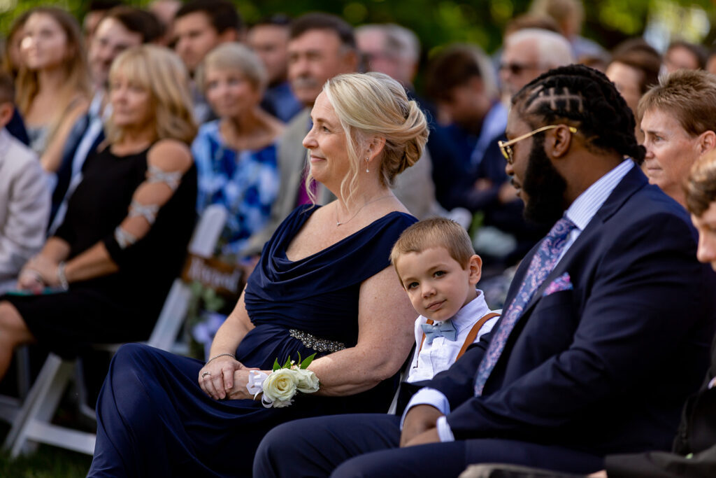 Elegant and adventurous mountain wedding at Stoneyman Valley Ranch – bride and groom portraits with Blue Ridge Mountain views, joyful first look, fun bridal party moments, and stunning sunset photos atop Little Stoneyman Overlook.