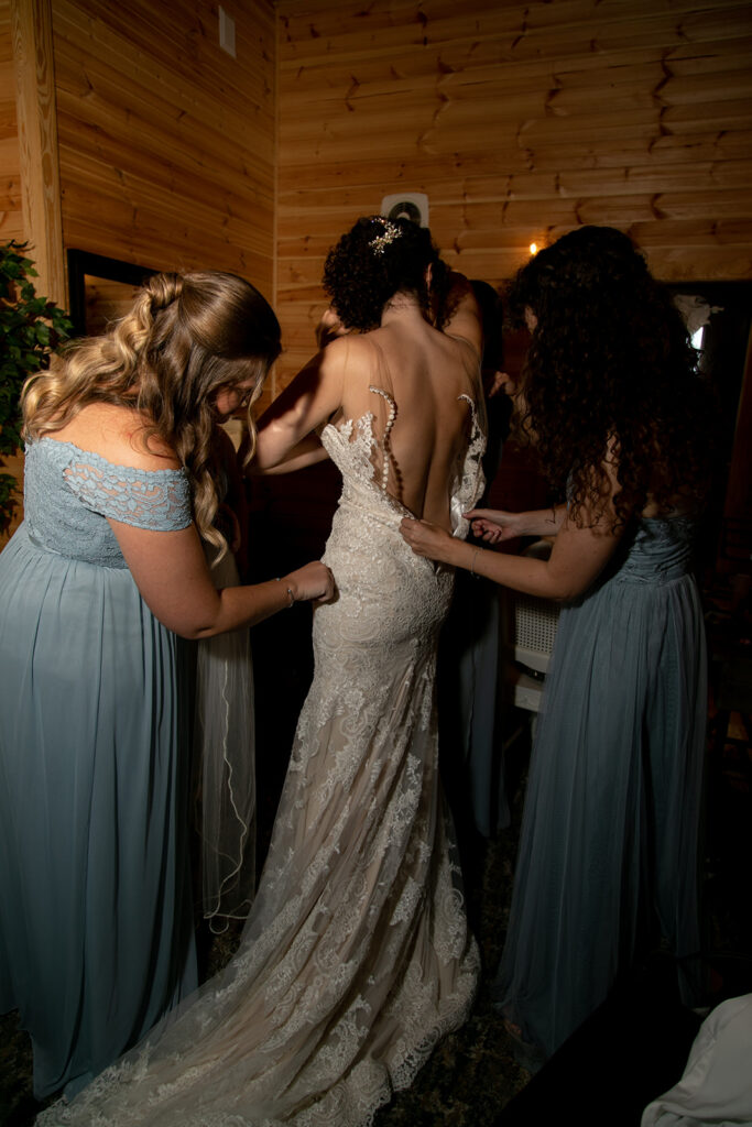 Elegant and adventurous mountain wedding at Stoneyman Valley Ranch – bride and groom portraits with Blue Ridge Mountain views, joyful first look, fun bridal party moments, and stunning sunset photos atop Little Stoneyman Overlook.