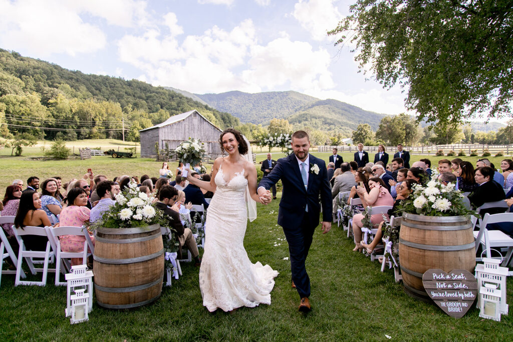 Elegant and adventurous mountain wedding at Stoneyman Valley Ranch – bride and groom portraits with Blue Ridge Mountain views, joyful first look, fun bridal party moments, and stunning sunset photos atop Little Stoneyman Overlook.