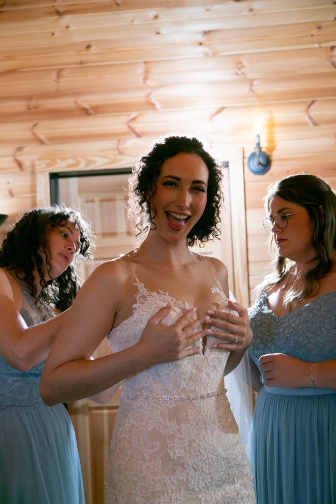 Elegant and adventurous mountain wedding at Stoneyman Valley Ranch – bride and groom portraits with Blue Ridge Mountain views, joyful first look, fun bridal party moments, and stunning sunset photos atop Little Stoneyman Overlook.