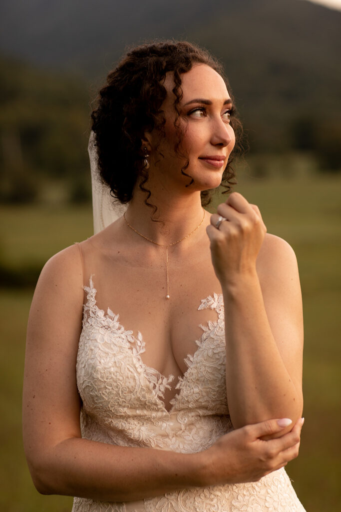 Elegant and adventurous mountain wedding at Stoneyman Valley Ranch – bride and groom portraits with Blue Ridge Mountain views, joyful first look, fun bridal party moments, and stunning sunset photos atop Little Stoneyman Overlook.