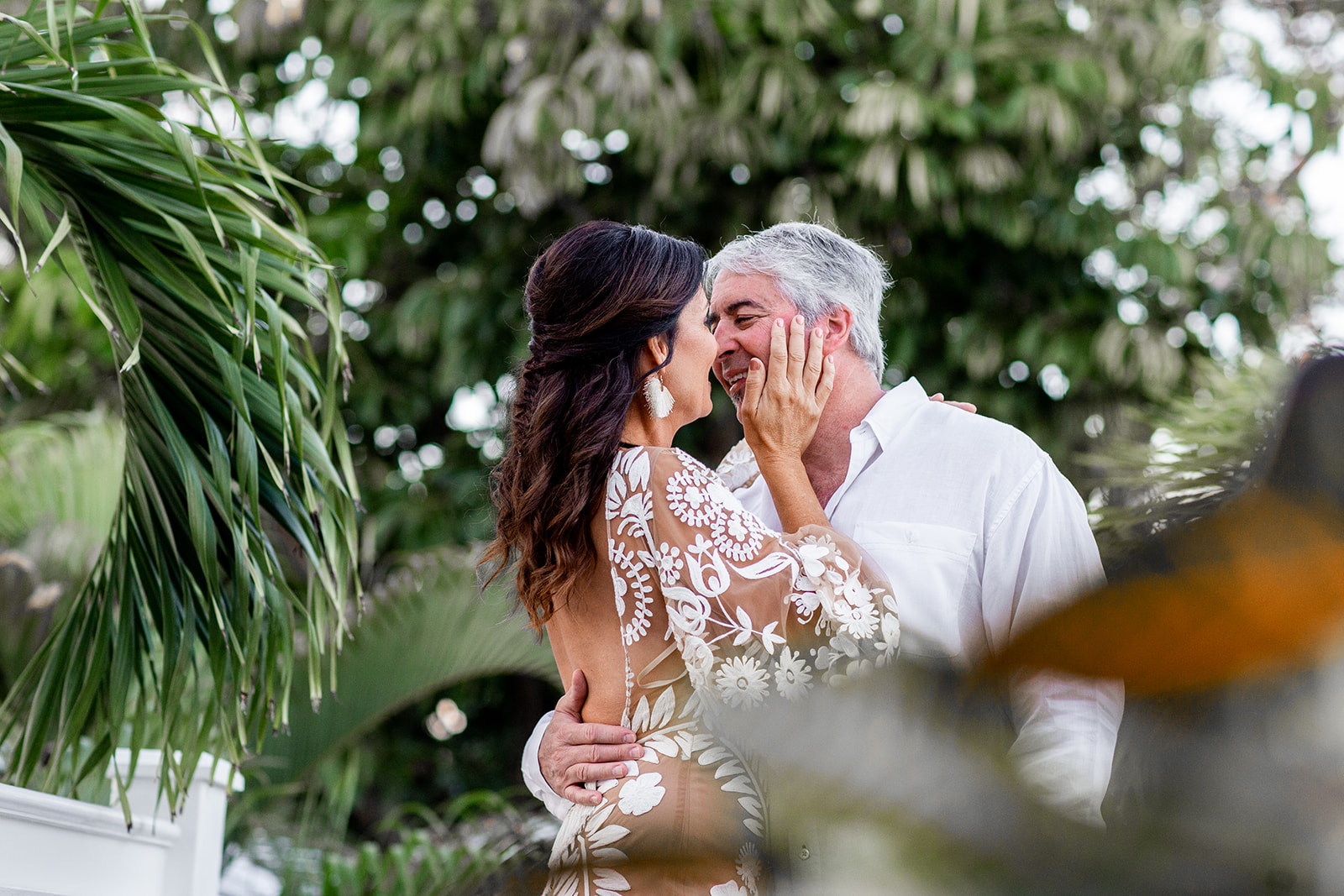 The bride and groom share a private and intimate moment together at their Key West destination wedding