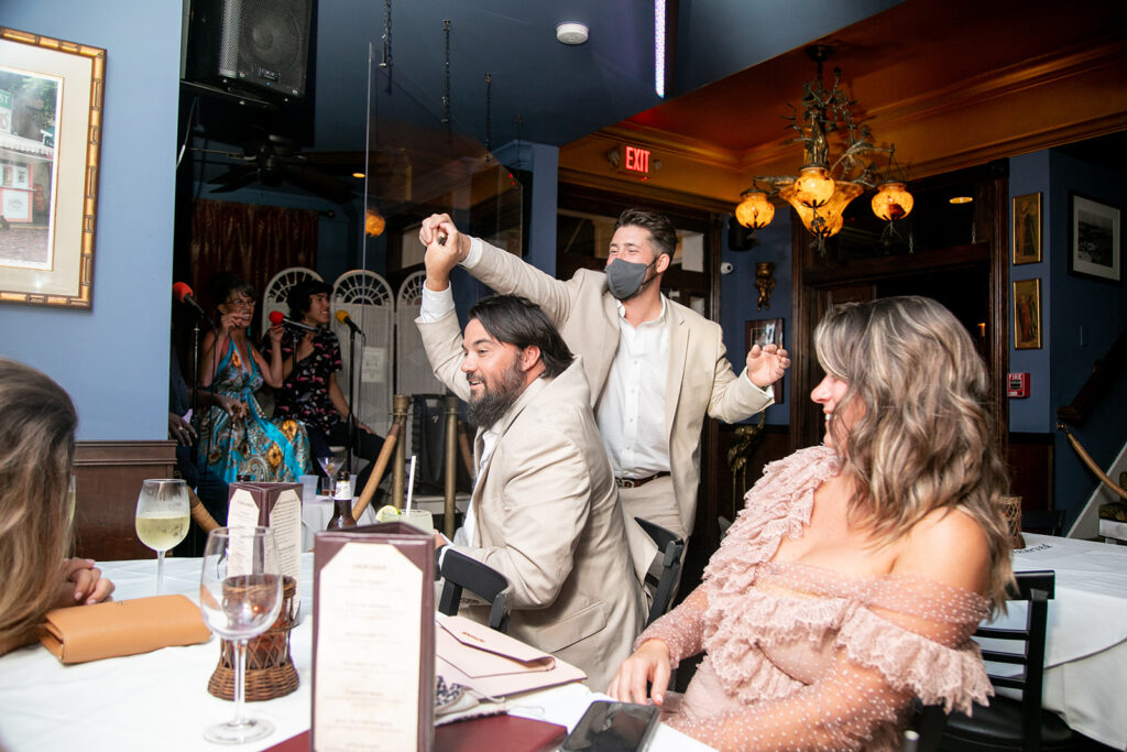Bride's sons try and get the party started with dancing at the intimate destination reception