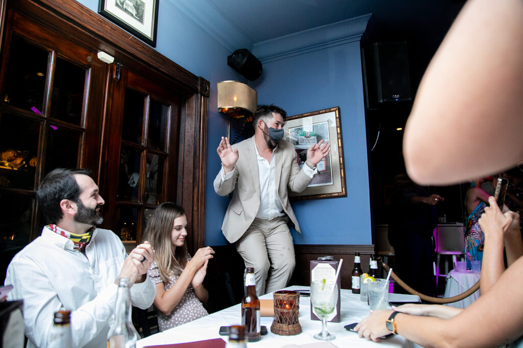 Bride's son dancing on a chair in Key West