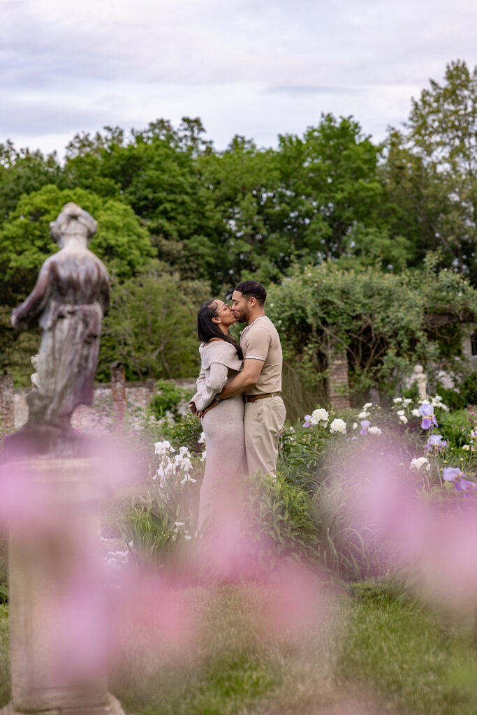 Romantic engagement photo framed by flowers after a surprise proposal near Washington DC