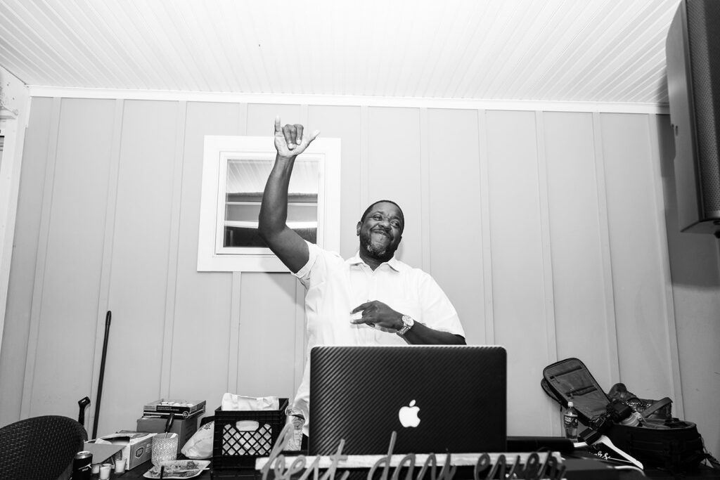 Candid dancing and joyful moments at an Ocean City backyard wedding reception