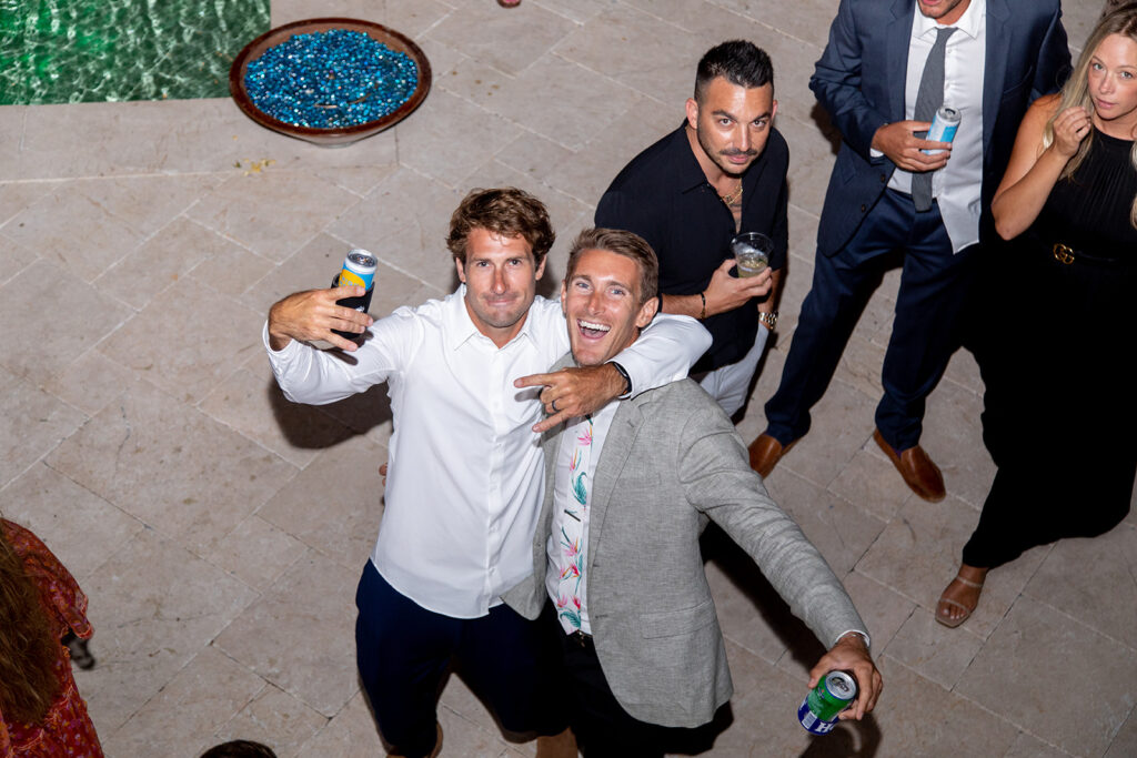 Candid dancing and joyful moments at an Ocean City backyard wedding reception