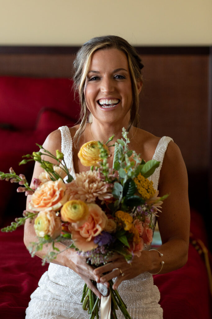 Bride getting ready with friends during a relaxed Ocean City MD beach wedding