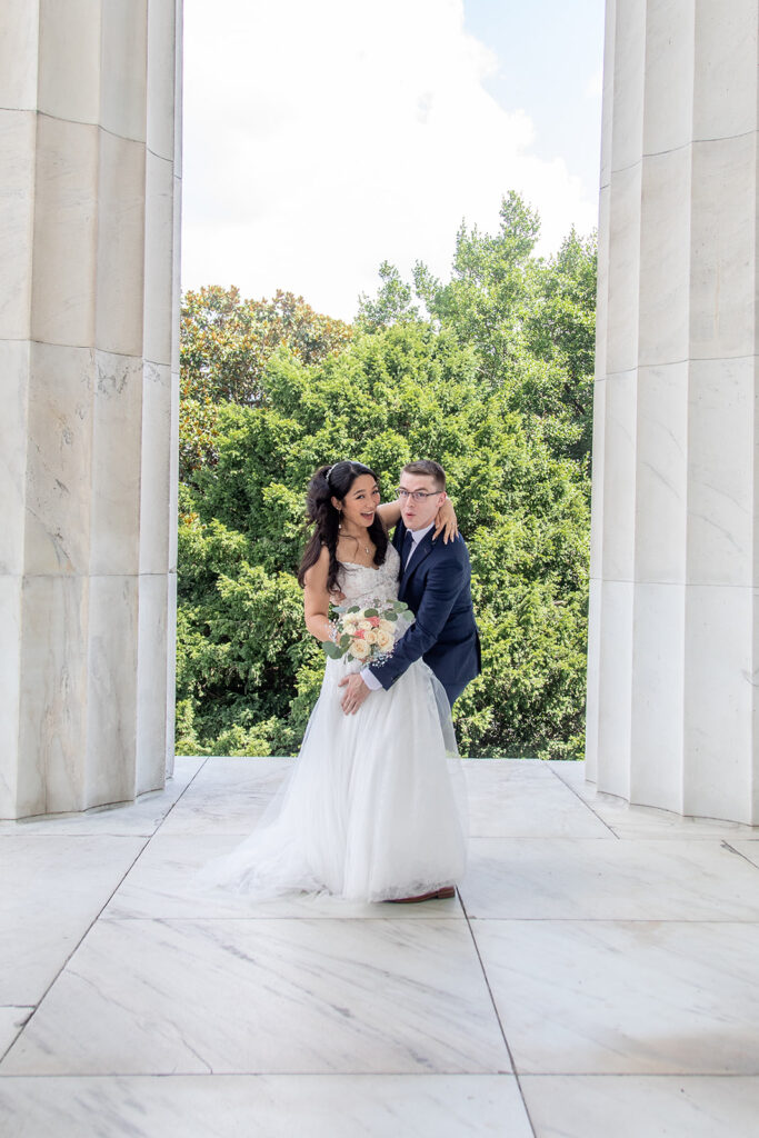 Lincoln Memorial elopement portrait with greenery in Washington DC