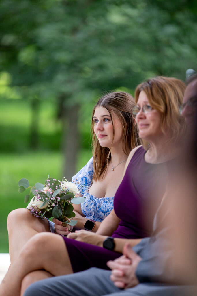 Wedding guests seated during an intimate DC War Memorial elopement ceremony