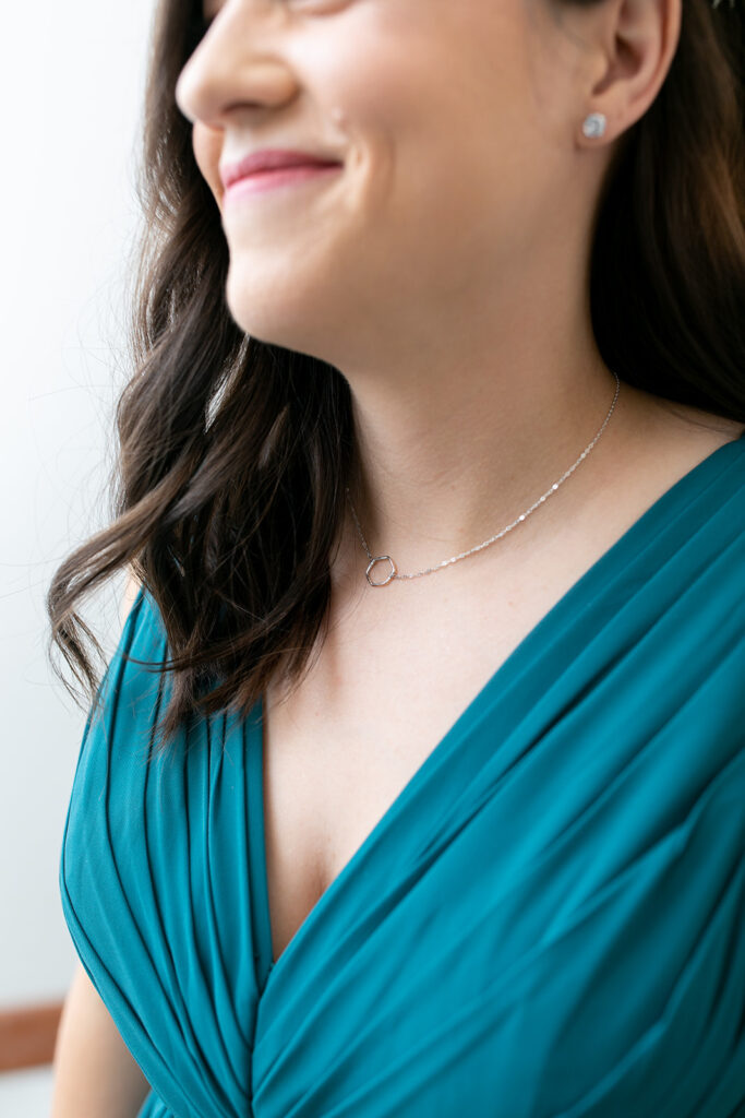 Bride getting ready in the bridal suite at The Woodlands at Algonkian in spring
