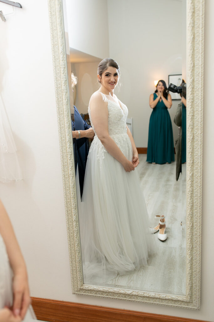 Bride getting ready in the bridal suite at The Woodlands at Algonkian in spring
