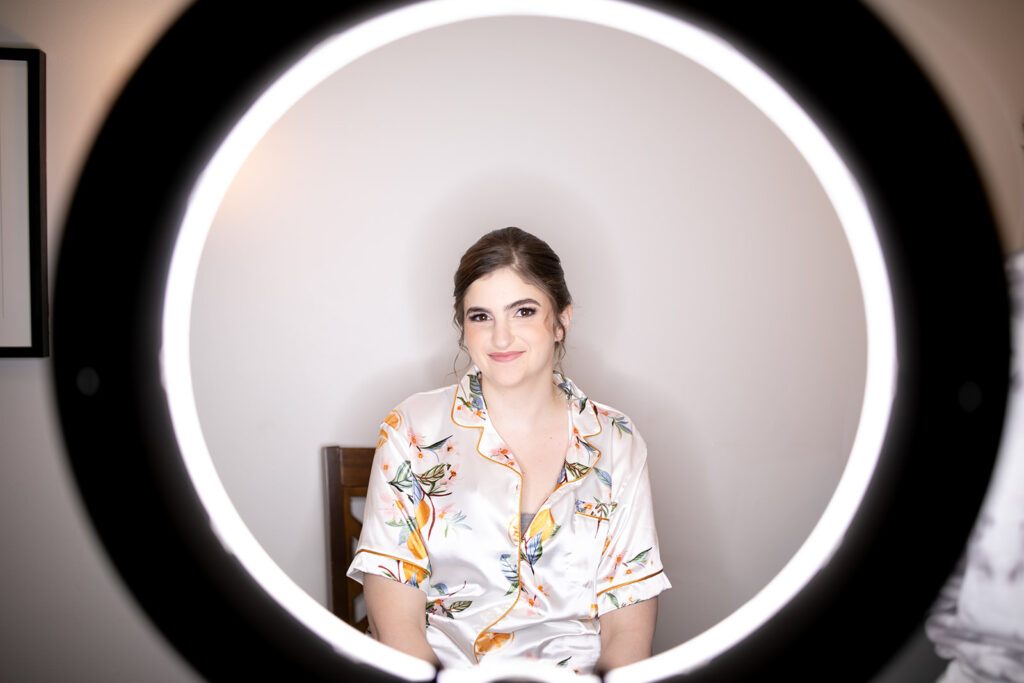 Bride getting ready in the bridal suite at The Woodlands at Algonkian in spring
