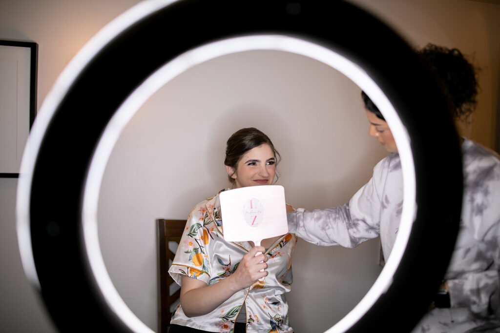 Bride getting ready in the bridal suite at The Woodlands at Algonkian in spring