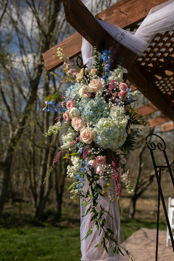 Spring outdoor wedding ceremony setup at The Woodlands at Algonkian