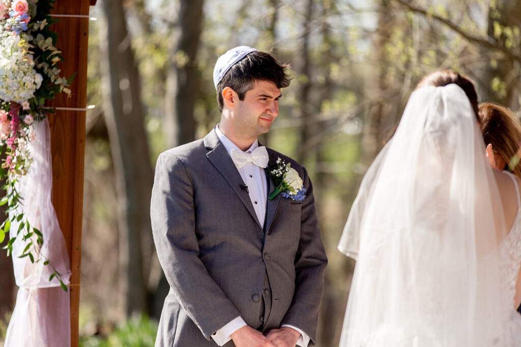 Spring outdoor wedding ceremony setup at The Woodlands at Algonkian