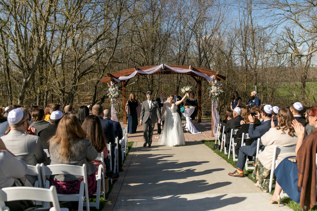 Spring outdoor wedding ceremony setup at The Woodlands at Algonkian