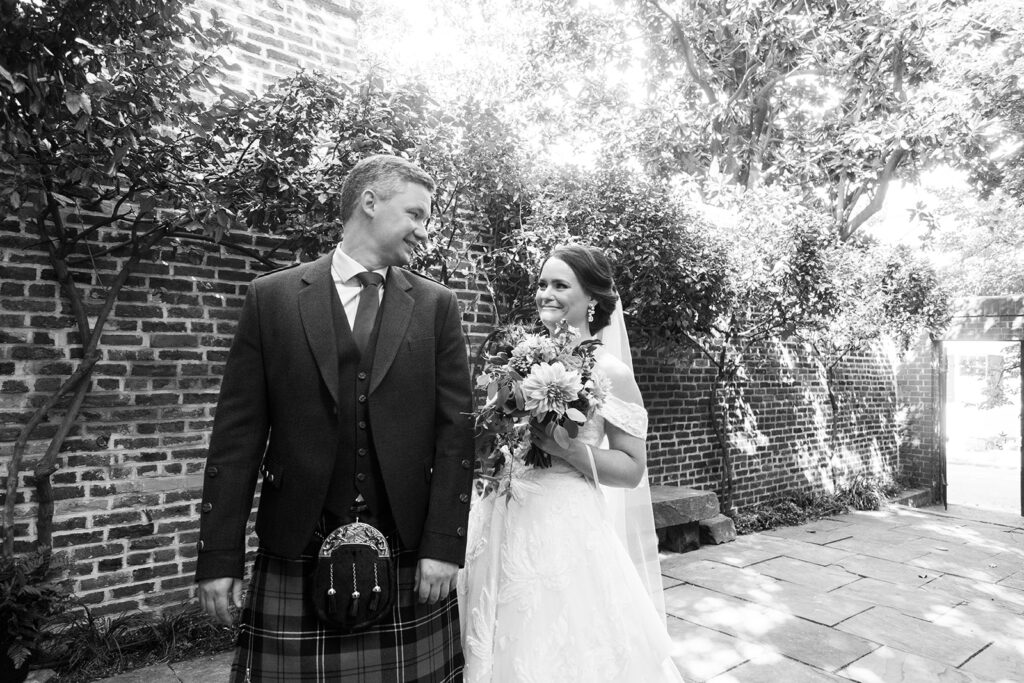 Bride and groom walking together after their first look during an intimate Alexandria wedding.
