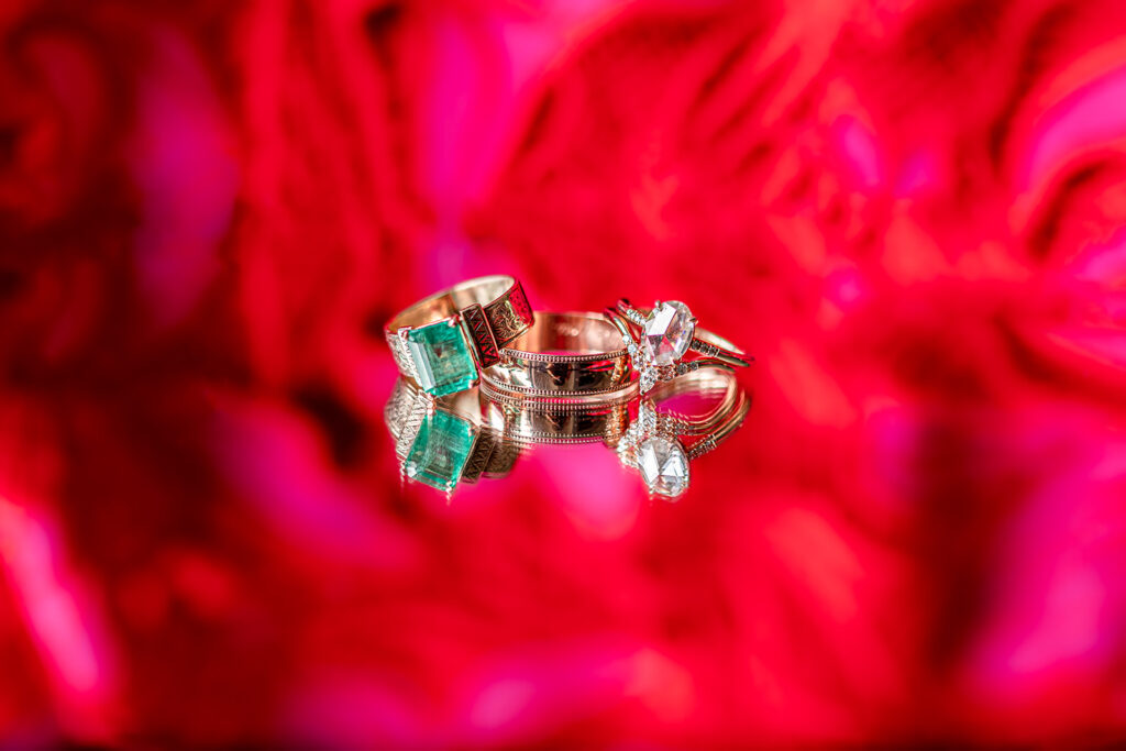 Close-up of Jodi and Stu’s colorful wedding rings photographed during their intimate Alexandria wedding.