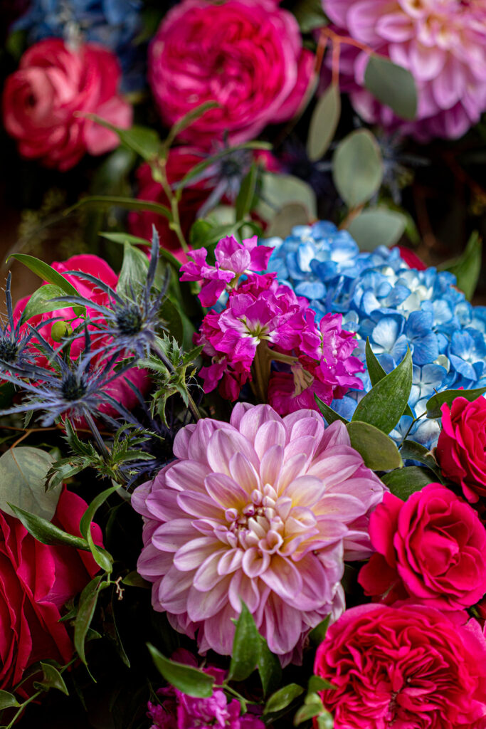 Bright and colorful wedding florals photographed at Jodi and Stu’s intimate Athenaeum wedding in Alexandria.