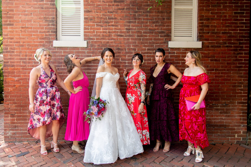 Bride standing with her bridal party for a portrait during an intimate wedding in Old Town Alexandria.