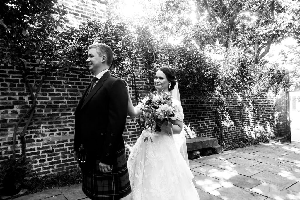 Bride and groom seeing each other for the first time during their intimate first look in Alexandria, Virginia.