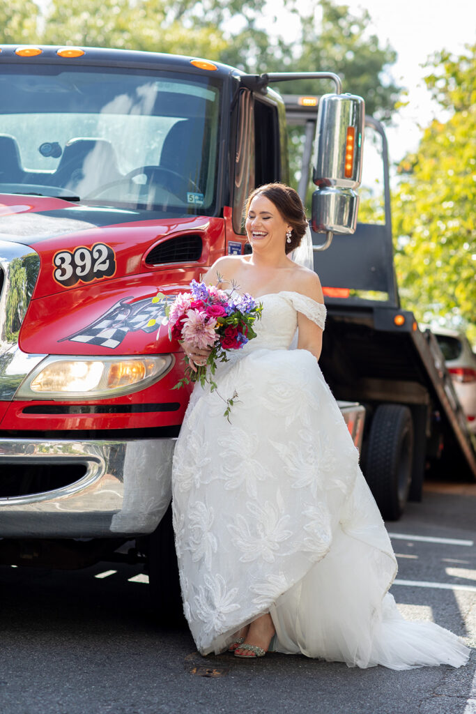 Bride smiling with her bouquet during an unexpected moment on her downtown Alexandria wedding day.
