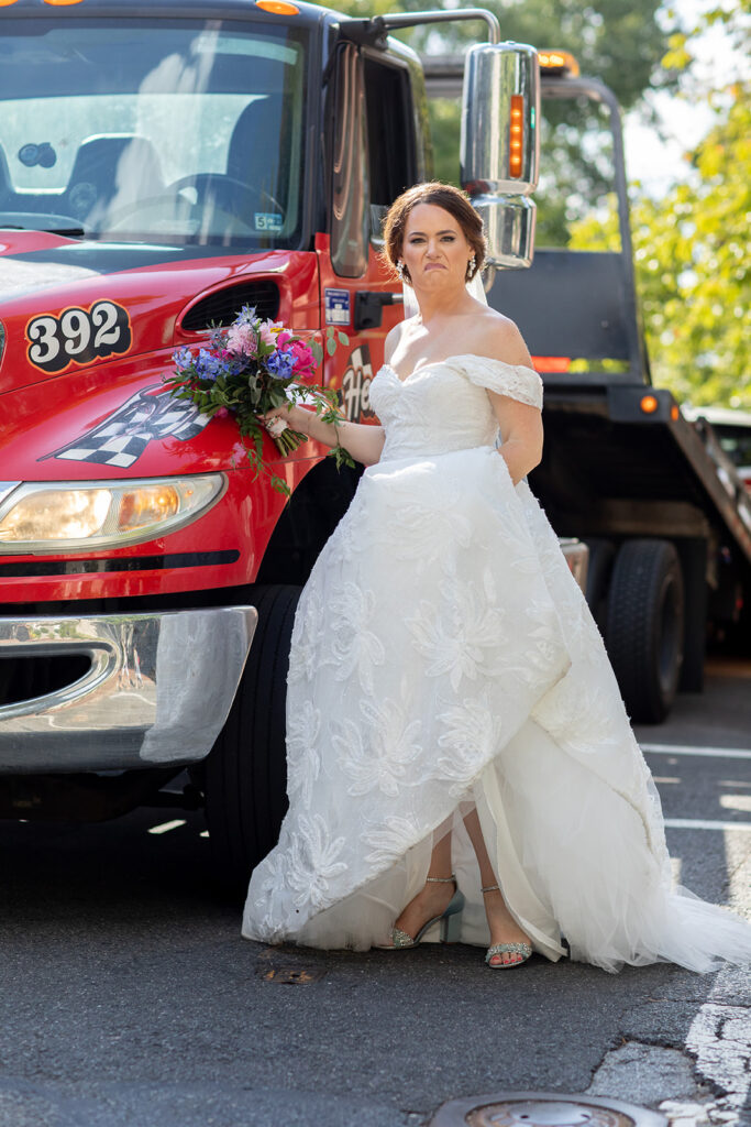 Bride playfully posing during an intimate wedding day in downtown Alexandria.