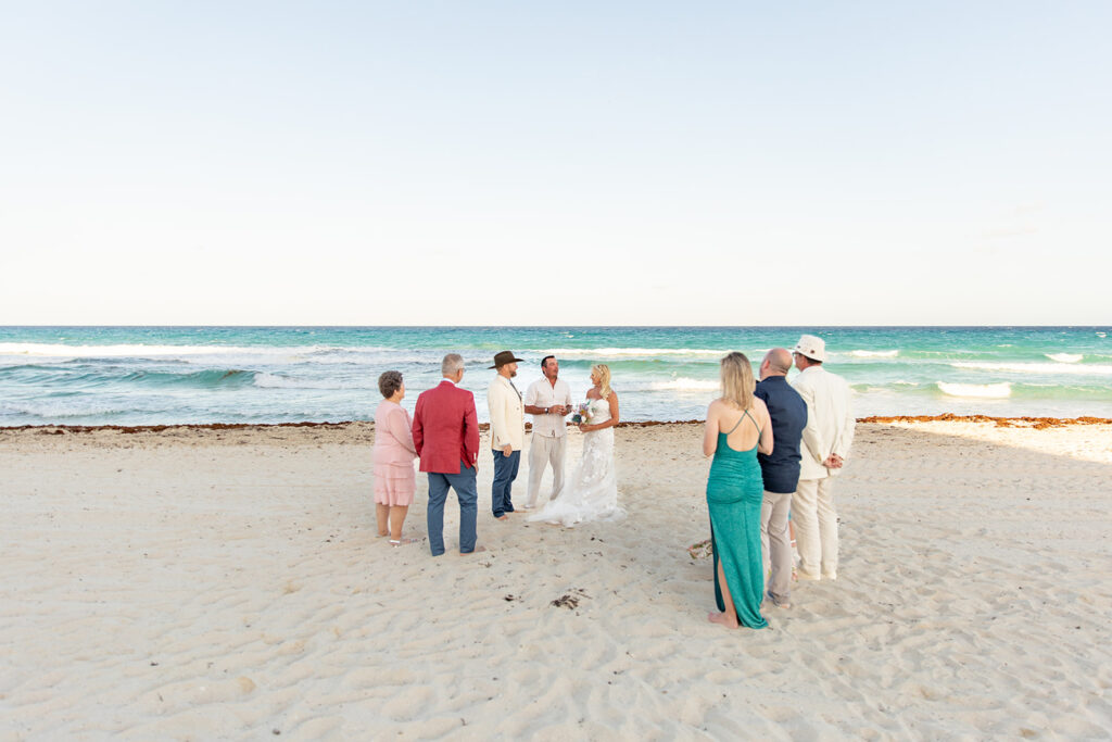 Intimate beach ceremony at Le Blanc Cancun destination wedding in Mexico
