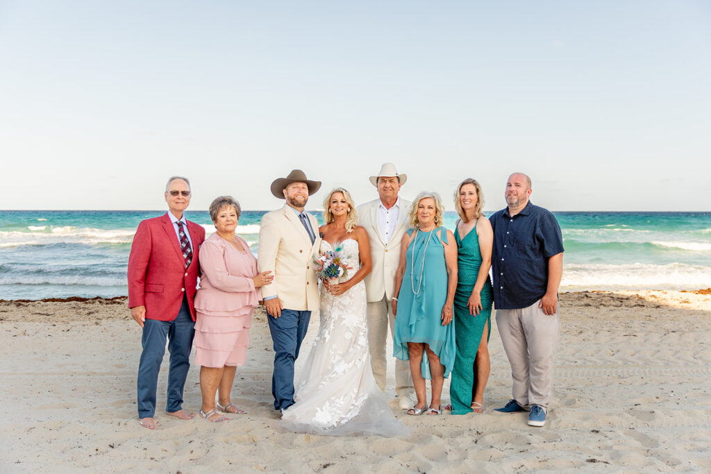 Small family group portrait at intimate destination wedding in Cancun, Mexico