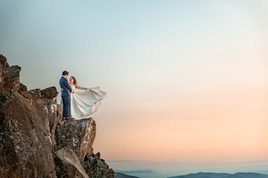 Phillip and Reanna standing on a cliff at Little Stony Man Summit during a Shenandoah post-wedding photo session