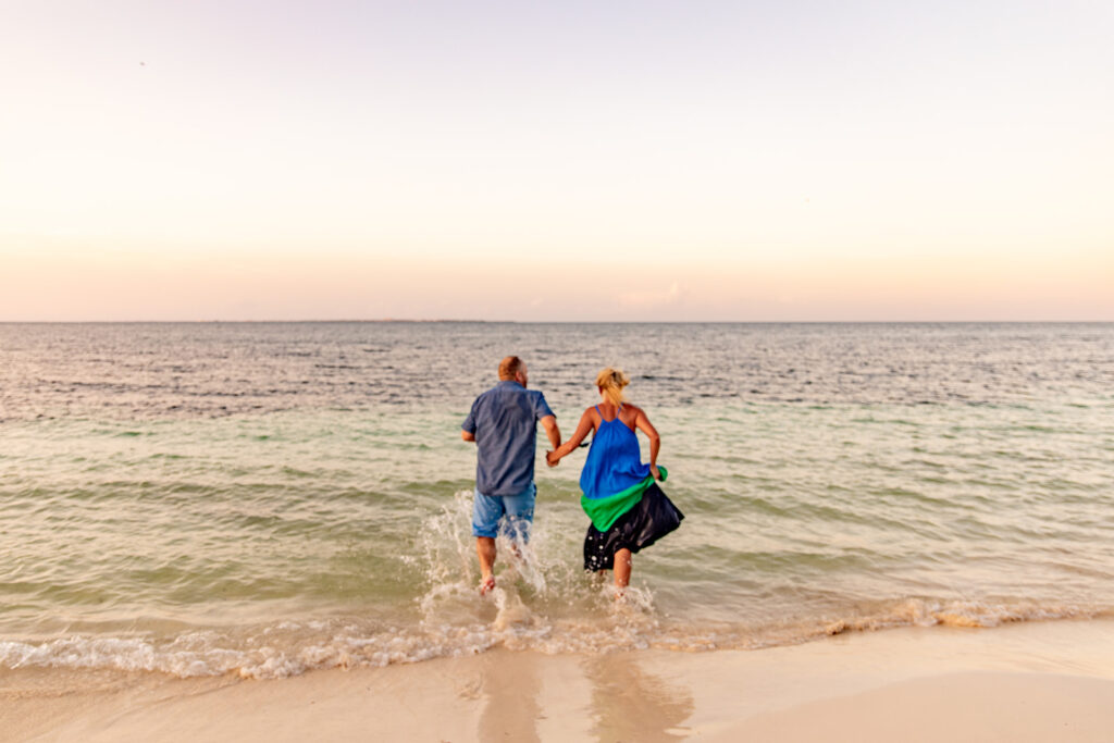 Relaxed day-after couple session on the beach in Cancun, Mexico